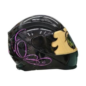 betty boop style custom handmade motorcycle helmet beside